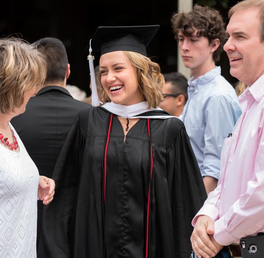 Parents with daughter at graduation